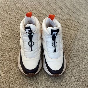 Women’s Sorel Cream and Brown Shoes